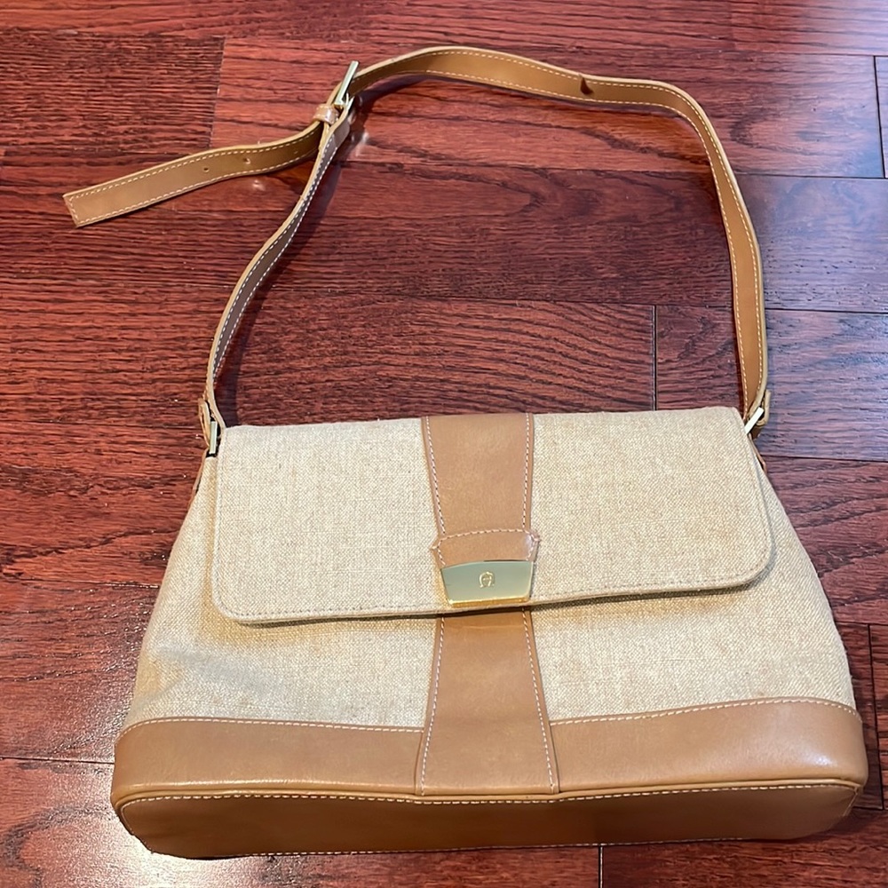 Etienne Aigner cream and tan leather shoulder bag.